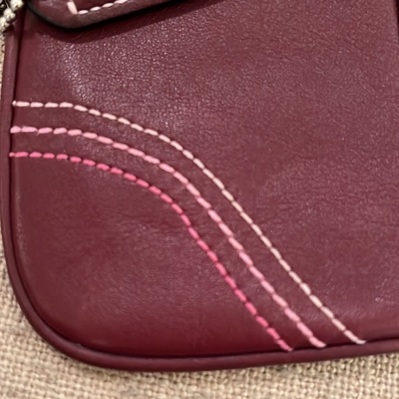 Authentic Coach wine wristlet with tri color stitching - Picture 2 of 4